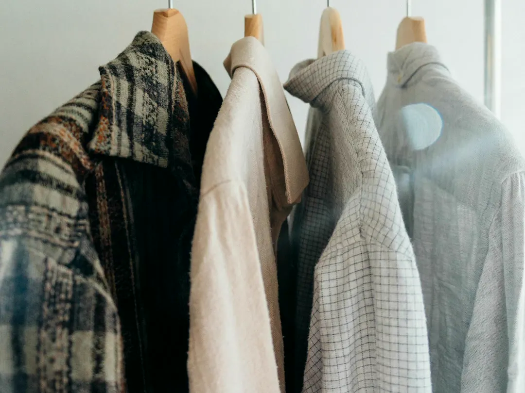 Shirts on hangers in a shop
